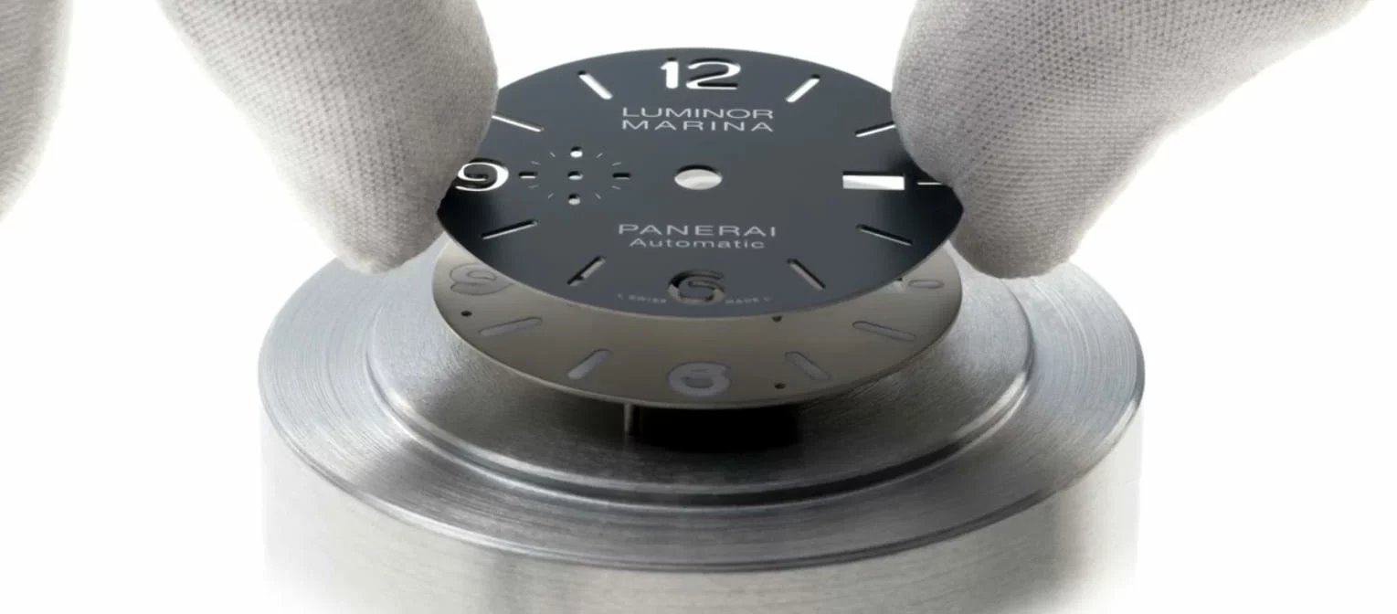 Why do some watches have a sandwich dial?